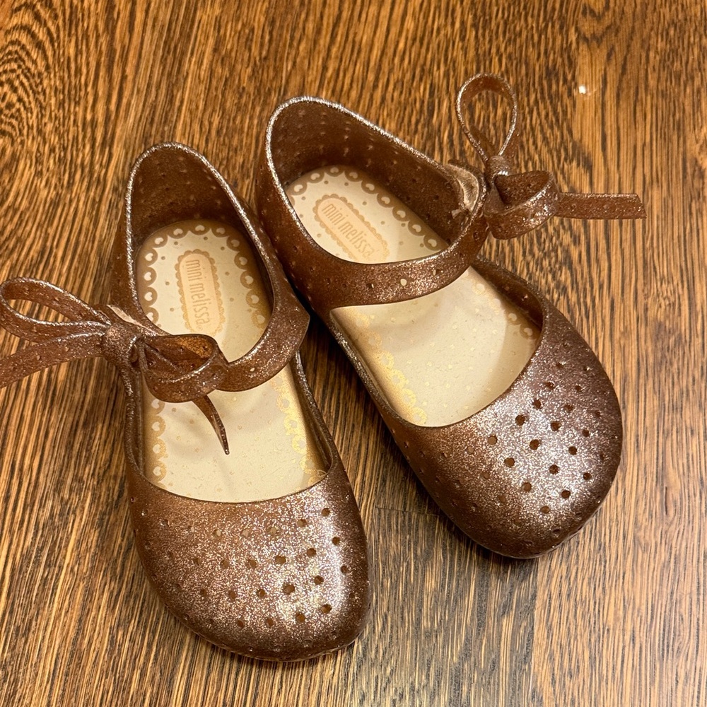 Like New Gold Sparkle Mini Melissa with Bow